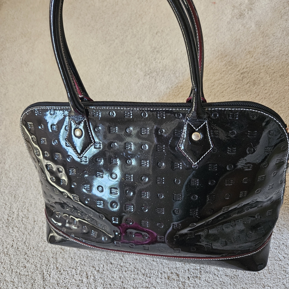 Arcadia Black Laptop Bag with Structured Design and Metallic Hardware